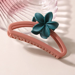 Matte pink-brown frangipani hair claw clip with large hollow semi-circle design