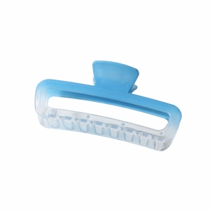 Detail view of large rectangular gradient blue hair claw clip with sturdy metal spring