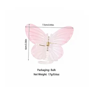 Pink gradient butterfly hair claw clip with gold spring measuring 7.5cm by 6cm