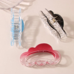 Three-piece Korean cloud hair claw clips in blue, black, and pink gradient acrylic