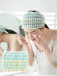 Action shot of high-elastic U-shaped headband for face washing with soft bubble texture