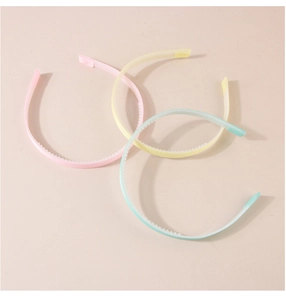 Detail view of macaron colored nonslip headbands with anti-slip teeth and wrapped ends