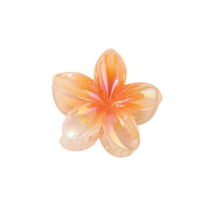 Elegant gradient orange and pink frangipani hair claw clip with pearlescent resin finish