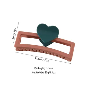 Pink rectangular hair claw clip with green heart design, 11.5cm length for thick hair