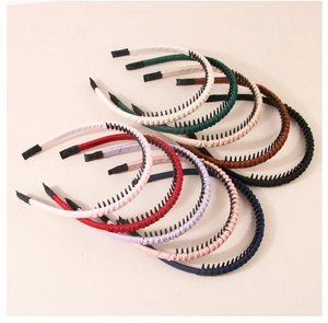 Detail view of colorful non-slip headbands with teeth and soft fabric finish