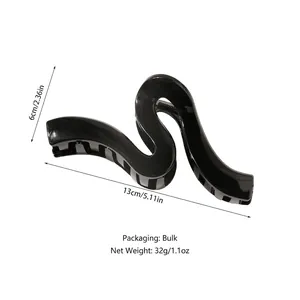 Minimalist large black wave hair claw clip for thick hair, measuring 13cm in length