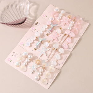 5-piece set of ocean-themed starfish hair clips with pink shells and pearls
