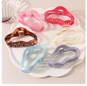 Detailed set of 6 colorful matte shark hair clips in various pastel and shell colors