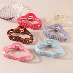 Set of large wave-shaped shark hair claws in multiple colors for thick hair