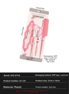 Pink hair styling tool kit with pulling needles and tail comb on card packaging