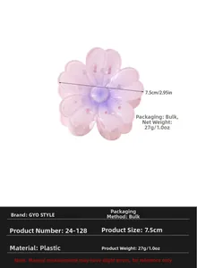 Detail of pink floral hair claw clip showing 7.5cm size and 27g weight measurements