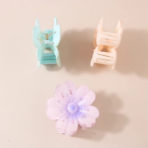 Floral claw clips set in lavender, blue and pink matte finish for elegant hair styling