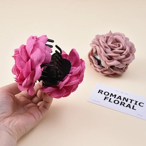 Large 3D fabric flower hair claw clip in rose pink for elegant updo hairstyles