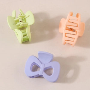 Three-piece set of matte bow shark hair clips in green, orange and purple colors