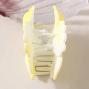 Elegant butterfly gradient hair claw clip with a matte finish and yellow white tones