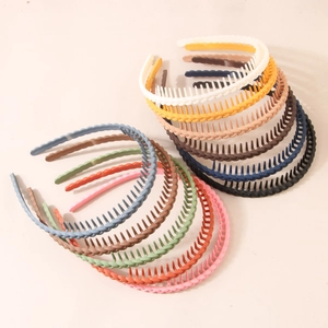 Matte plastic headbands with inner teeth set in various vibrant colors for women