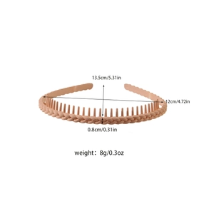 Matte apricot plastic headband with woven texture and teeth showing size specifications