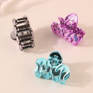 Three-piece set of elegant metallic hair claws in silver, purple, and blue colors