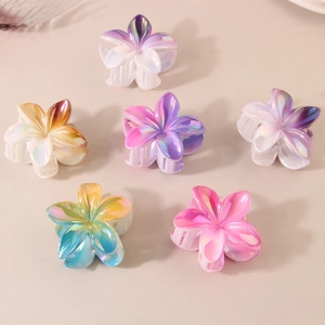 Frangipani hair claws with iridescent pearlescent finish in six vibrant colors
