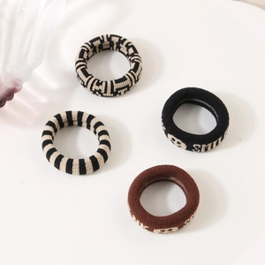 Set of four minimalist high-elastic hair scrunchies with vintage knitted patterns