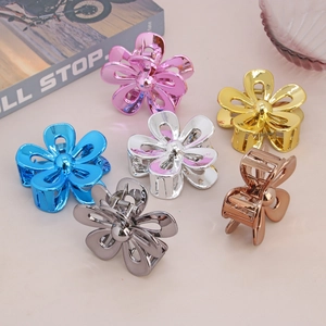 Set of 6 metal-finish flower hair claws in assorted colors like gold and rose gold
