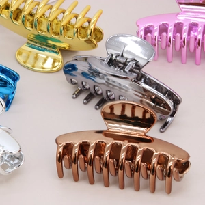 Metallic finish shark hair claw clips in assorted vibrant colors for elegant styling