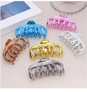 Set of six large octopus hair claws in glossy metallic colors for thick hair