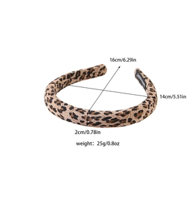 Detail view of leopard print headband with dimensions and handmade interior label