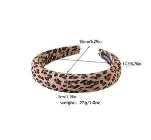Detailed size view of the vintage leopard print headband with handmade label