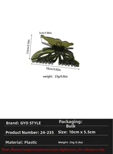 Détail de la grande pince à cheveux papillon vert foncé avec dimensions 10x5,5 cm