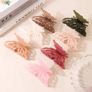 Pinces à cheveux papillon élégantes en diverses couleurs avec finition acrylique mate pour femme