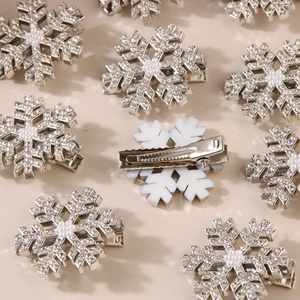 Elegant sparkling silver snowflake hair clip with rhinestones and white pearls