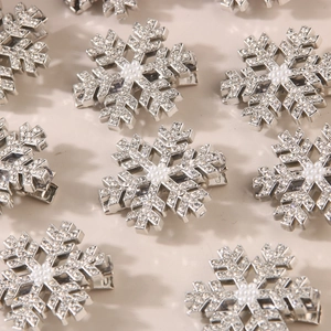 Elegant silver snowflake hair clips with shimmering crystals and pearls in grid layout