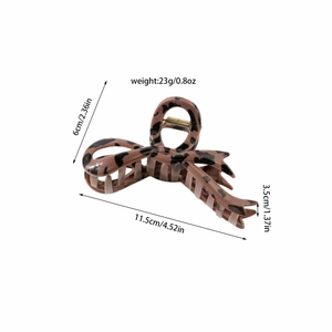 Detail showing dimensions and 23g weight of the leopard print large bow hair claw clip