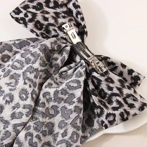 Handmade leopard print bow hair clip with vintage silver spring metal clasp