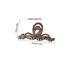 Detail view of large leopard print hair claw clip showing 13cm size and weight data