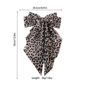 Large leopard print bow hair clip with long ribbons, measures 20.5cm by 33cm size
