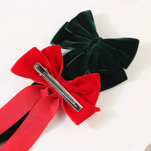 Elegant velvet bow hair clips in red and dark green with stable metal duckbill grip