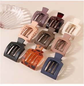 Collection of matte and glossy square hollow hair claw clips in various elegant colors
