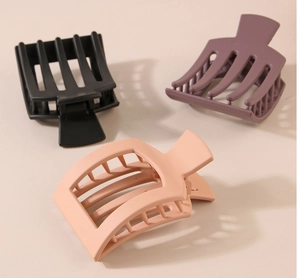 Three-piece set of matte rectangular hollow hair claws in black, pink, and purple colors