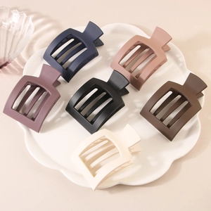 Modern square hollow hair claws in six matte colors including navy and cream beige