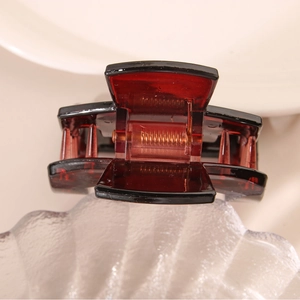 Minimalist square PC hair claw clip in dark reddish-brown with elegant black edging details