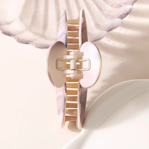 Large oval matte lavender hair claw clip with frosted texture and elegant marble effect