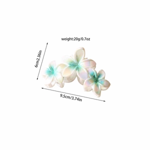 Détail de la pince à cheveux fleur montrant 9,5 cm de long et des pétales dégradés