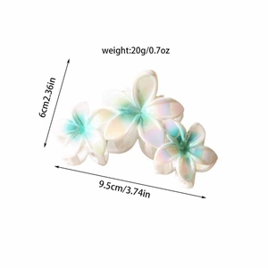 Pince à cheveux motif fleurs de frangipanier blanc nacré avec dégradé bleu élégant