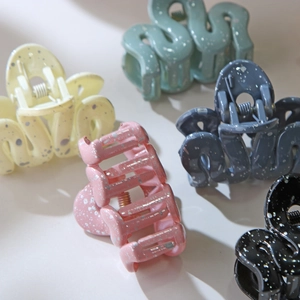 Morandi color wave hair claw clips with ink splash texture in multiple pastel colors