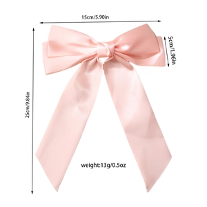 Pink satin bow hair clip with long ribbons for women, elegant hairstyle accessory