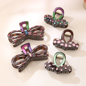 Five-piece set of brown polka dot hair claws with elegant bows and heart shapes