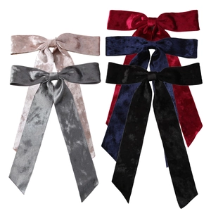 Elegant velvet long ribbon bow hair clips set in five assorted colors on white background