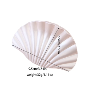 Elegant shell shaped hair claw clip with a pearlescent finish for women summer beach style